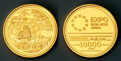 一万円金貨幣の表面と裏面の図柄